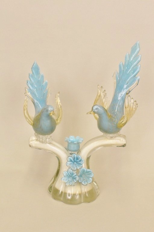 Italian Art Glass Sculpture with Birds: Art glass table sculpture in clear, blue and white glass with gold metallic accents depicting two plumed blue birds perched on branches of a tree with five blue flower blossoms. Unmarked. Height 15.75