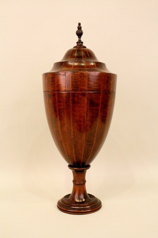 Federal Style Knife Urn: 19th century. Urn form with string inlay mahogany. Slits in four concentric rings within. Height 26.25 inches.