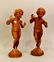 Pair of Cast Iron Wingless Putti Figures