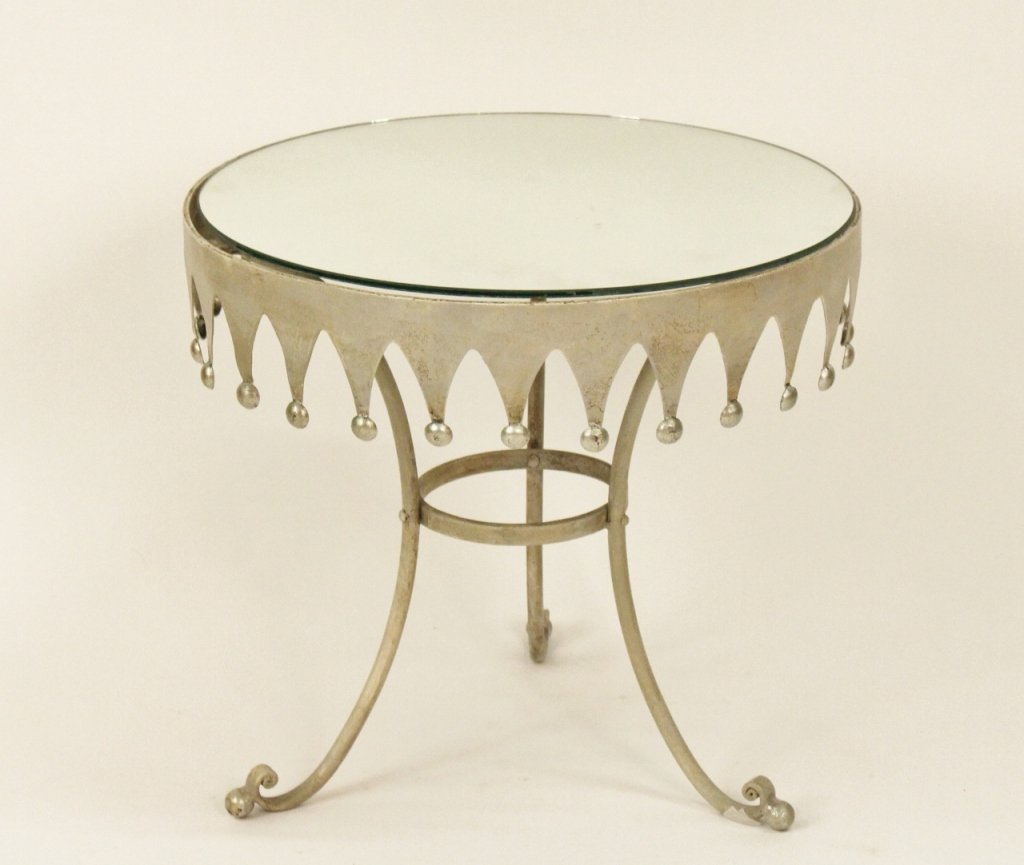 Small Iron & Mirrored Round Table: Contemporary silver painted iron framed table with circular mirrored top. Table with pointed decoration with circular accents on tips. Ocassional table or accent table raised on three splayed legs wit