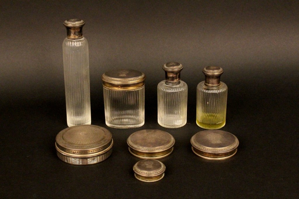 Eight Vanity Items, Paul Sormani & Others: Eight vanity vessels and items including powder box, three ribbed glass vessels of varying size with monogrammed metal tops each marked "P. SORMANI PARIS" and three additional circular lids, likely to