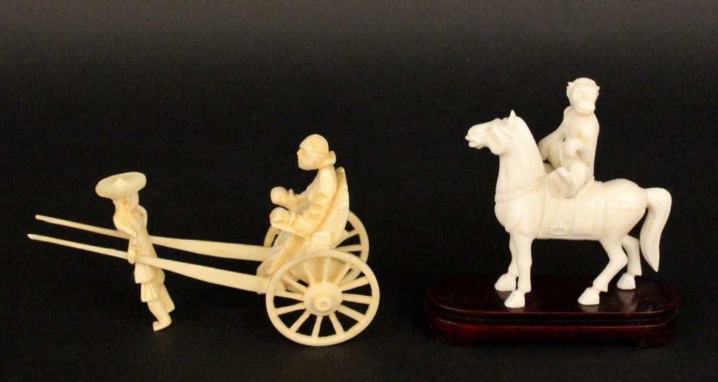 Two Oriental Carved Ivory Figurines: Two carved ivory figurines including one of a man riding in a rickshaw being pulled by a man in a large hat. Rickshaw with moving wheels. The other of a chimpanzee or monkey riding on a horse raised o