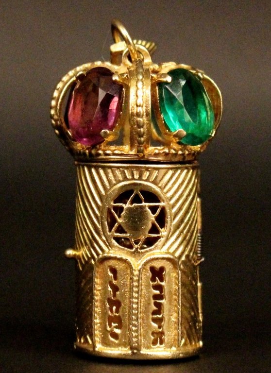 14k Gold, Jeweled Judaica Tabernacle Pendant: 14k yellow gold tabernacle form pendant with four gemstones at top of crown. Miniature Judaica tabernacle form pendant with the Ten Commandments in Hebrew underneath Star of David on hinged swing fron