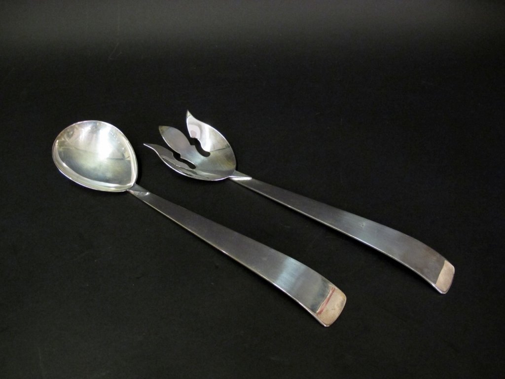 Three Crowns Silverplate Salad Servers: American, last half of 20th century. Mid century modern silverplated salad fork and spoon serving utensils in streamlined design. Marked on back with Three Crowns, Potterstown, Pennsylvania mark. Acco