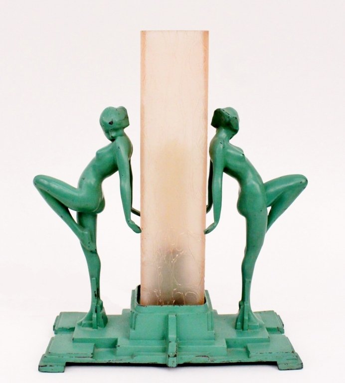 Frankart Figural Lamp (L222): Frankart (American 1920s-1930s), No. L222. Original Frankart figural lamp depicting two young female nude dancing beauties with knees bent and raised and arms pulled back holding a squared rose pink c