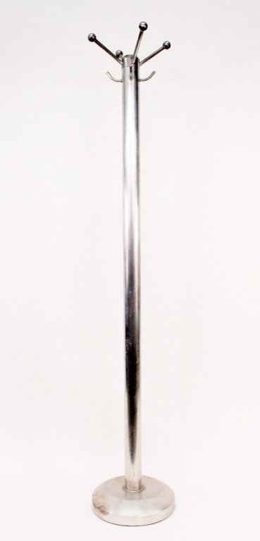 Modern Chrome Coat Rack: Modern streamlined chrome metal coat and hat rack. Rack with eight hooks for hanging items connected to long cylindrical shaft on a circular base. Height 67". Provenance: From the Collection of Walter