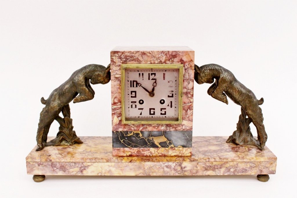 French Art Deco Marble Clock, F. Martin: French Art Deco red marble clock with butting lamb spelter mounts on side flanking clock face within rectangular marble block with black marble horizontal band. Square clock face with light grey metal