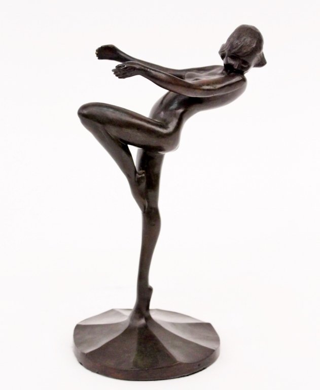 Frankart Bronze Figural Ashtray (T301): Frankart (American 1920s-1930s), T310. Original Frankart figural ashtray in patinated bronze metal depicting a young female nude with head turned over her shoulder leaning back slightly with arms exte