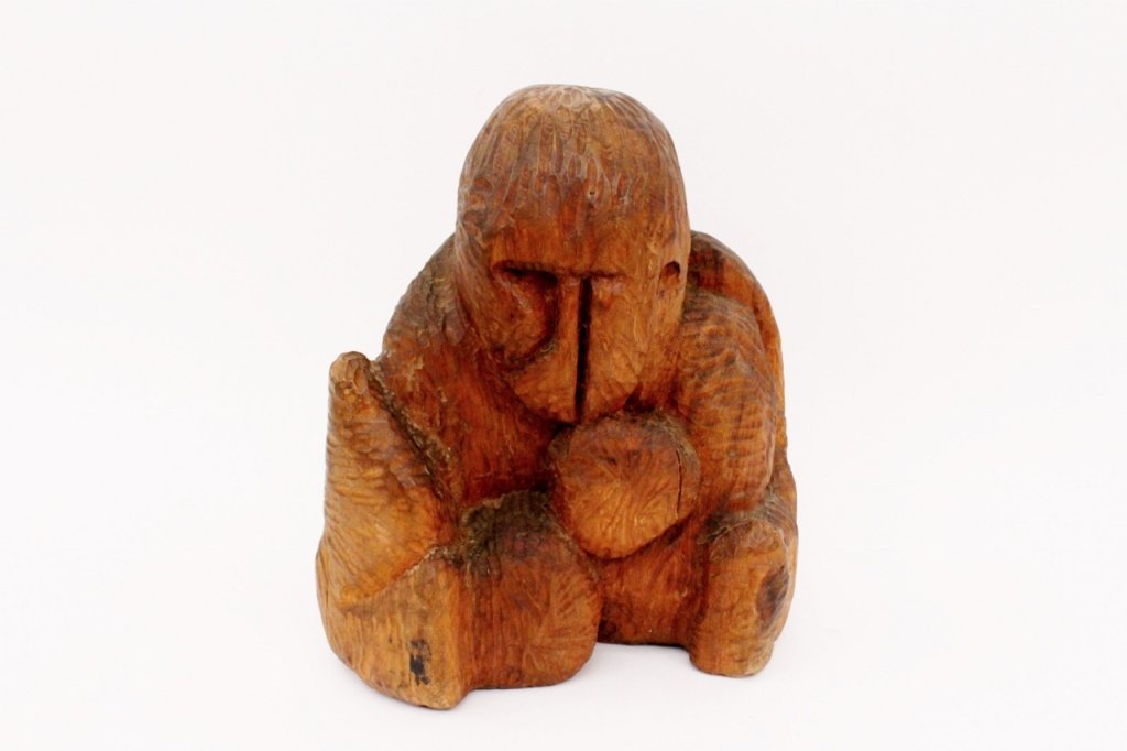 Curtis A. Watson Hand Carved Gorilla Sculpture: Curtis A. Watson (American, 20th century). Hand carved wood animal sculpture depicting a seated gorilla. Signed on bottom "CURT WATSON". Height 15", width 13" depth 11".