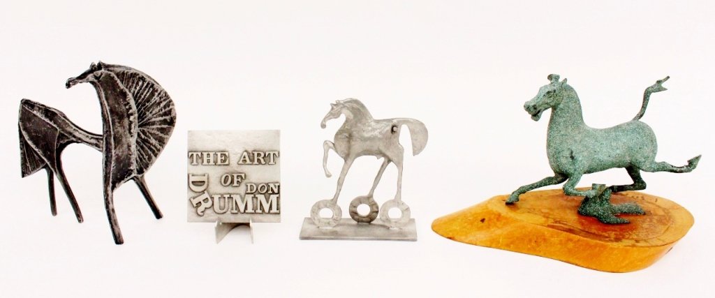 Group of Three Horse Sculptures: Three table top horse sculptures or figurines including a lightweight metal horse in abstract style, indistinguishably marked on the side; a Don Drumm chrome colored metal figurine of a horse raised o