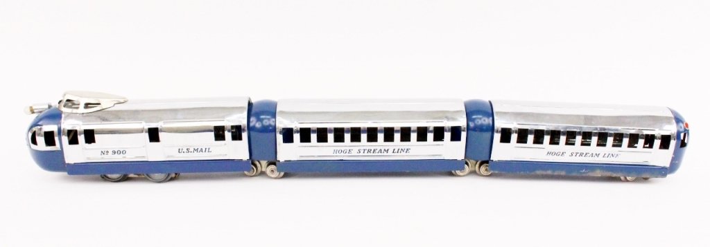 Hoge Stream Line Train No 900: Hoge streamline O gauge metal train with chromed metal and blue finish. Set includes a No 900 U.S. Mail Engine, two connectors, a coach car and a tender.