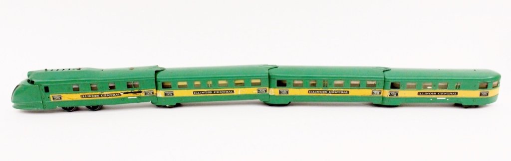 American Flyer Illinois Central Train: American Flyer (circa 1930s), prewar metal train with green exterior with yellow band and lithograph text that identifies the streamliner as "AMERICAN FLYER LINES" and "ILLINOIS CENTRAL". Train with e