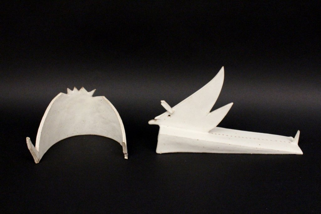 Two Bruno Gambone Ceramic Animals: Bruno Gambone (Italian 20th century). Two unmatched whimsical modern animal table sculptures with stylized accents such as tails or horns attached to large simplified bodies. One with pointed horn on