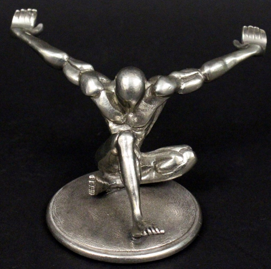 Jac Zagoory Designs Pen Holder: Polished pewter pen holder in the form of a stylized muscular male form. This is part of "The Pen Holder Collection" by well-known pen collector Jac Zagoory. Marked on bottom. Measures 2.5" high x 4.7