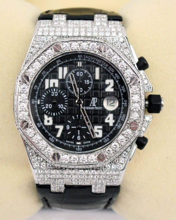 Audemars Piguet Men's Royal Oak Offshore Watch: Audemars Piguet men's stainless steel Royal Oak Offshore Chronograph with diamond encrusted case and bezel. With original box and papers.