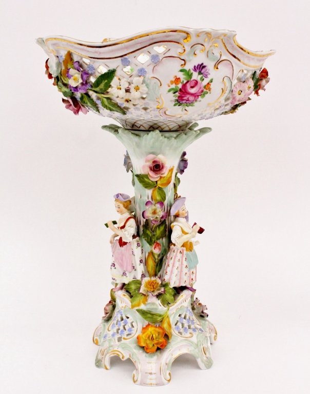 Large Dresden Figural Epergne: Large Dresden figural porcelain epergne with large reticulated lattice accented basket at top with undulating rim raised on a tree trunk and leaf form shaft with three figures at full length standing 