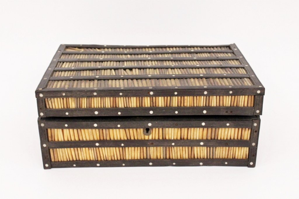 19th C. Quill Work Fitted Box: 19th century. Rectangular lidded box with quill work on exterior contained within ebonized wood bands with mother of pearl dot accents. Hinged lid lifts to reveal nine small compartments, each with re