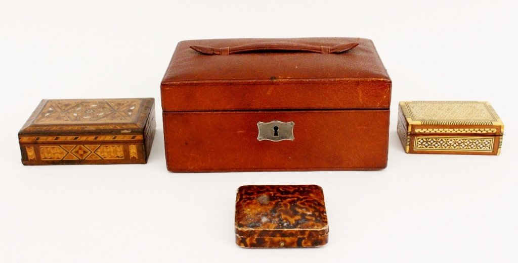 Group of Four Lidded Boxes: Collection of boxes including a brown leather covered lidded rectangular box with handle on top of lid that opens to revel green velvet lined interior; a rectangular wooden box with wooden and mother