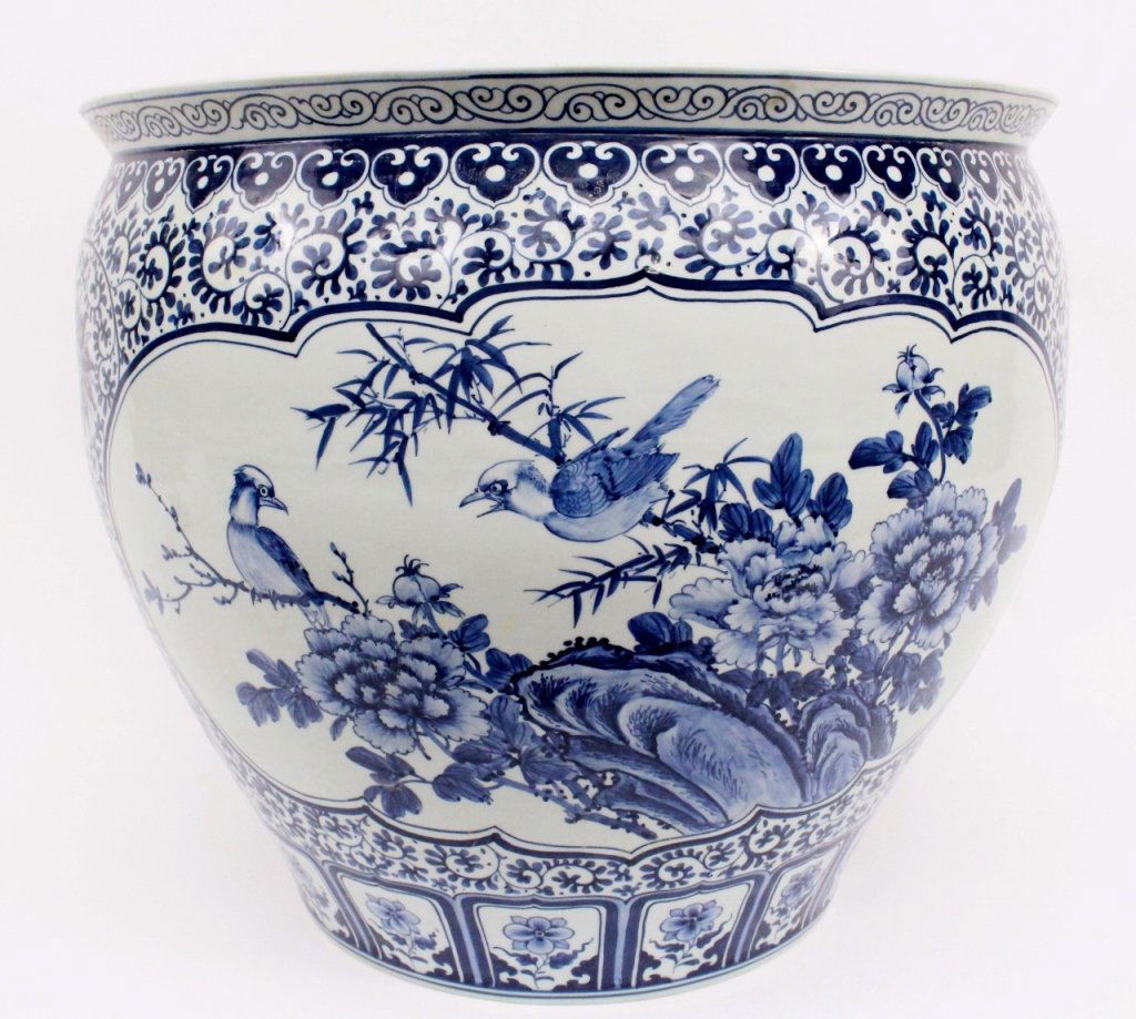 Large Chinese 19th C. Blue and White Fish Bowl: Chinese, 19th century. Large porcelain fish bowl or planter with blue and white hand painted decoration on exterior with floral and leaved banding at top above additional banded decoration surrounding