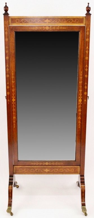 Sheraton Mahogany & Inlaid Cheval Mirror: 19th century. Sheraton mahogany wood and inlaid satinwood cheval mirror with urn, scrolled and floral motif on frame surrounding adjustable vertically aligned looking glass. Urn finials at top. Mirror