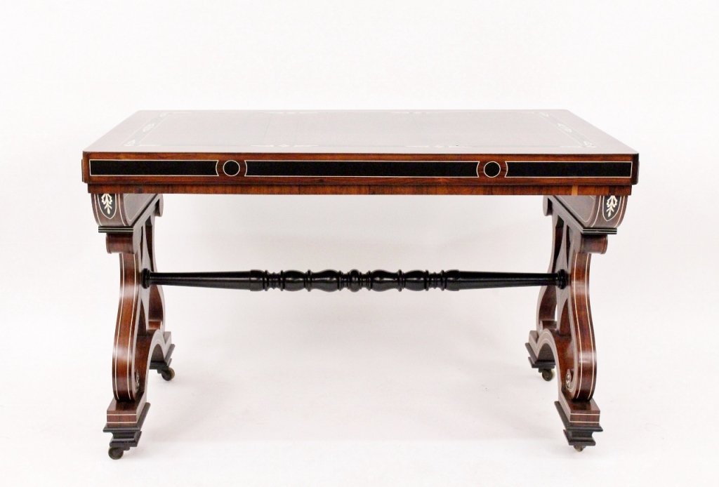Ivory & Ebony Inlaid Rosewood Library Table: English, second quarter of 19th century. George IV ivory and ebony inlaid rosewood draw leaf library table. Table with rectangular top decorated with inlaid ebony and ivory floral motif border. Geomet