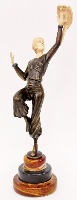 Paul Philippe Bronze & Ivory Figure: Paul Philippe (French, 1870-1930), bronze and ivory figural sculpture depicting a woman in Orientalist (Turkish) costume balancing on one leg, the other with knee lifted holding a ivory parrot in hand