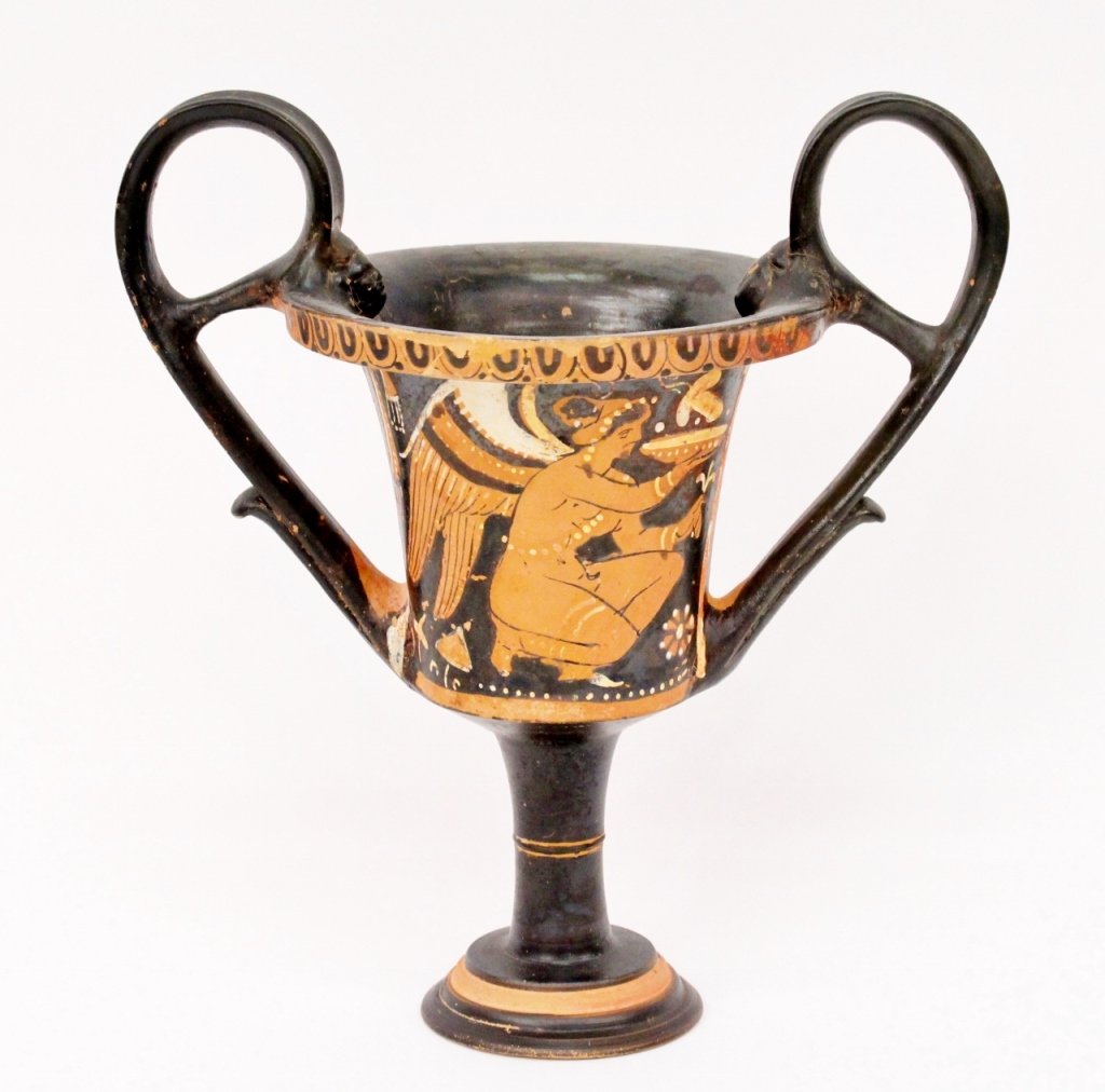 Greek Red Figure Kantharos: Greek Apollonian Kantharos with red figure decoration on exterior of a seated woman on one side, the other side with winged nike (victory) figure holding bowl. Vessel with arched handles with facial a
