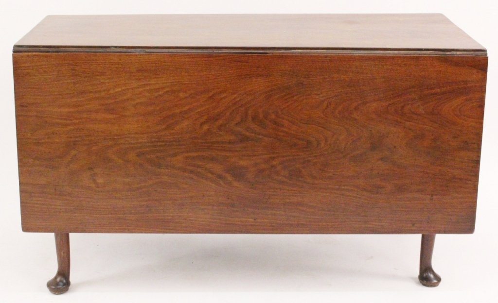 Queen Anne Drop Leaf Table: 19th century. Queen Anne mahogany wood drop leaf table of traditional form with rectangular top with to rectangular drop leaves that raise on gate legs terminating on pad feet. Height 27.75", width (w