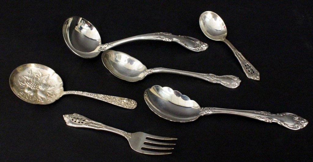 Group of 6 Pieces of Sterling Silver Flatware: Group of six unmatched pieces of sterling silver flatware comprising of a S. Kirk & Son sterling repousse spoon with fruit and floral motif; a Towle "Old Master" sterling spoon with scalloped edge; a 