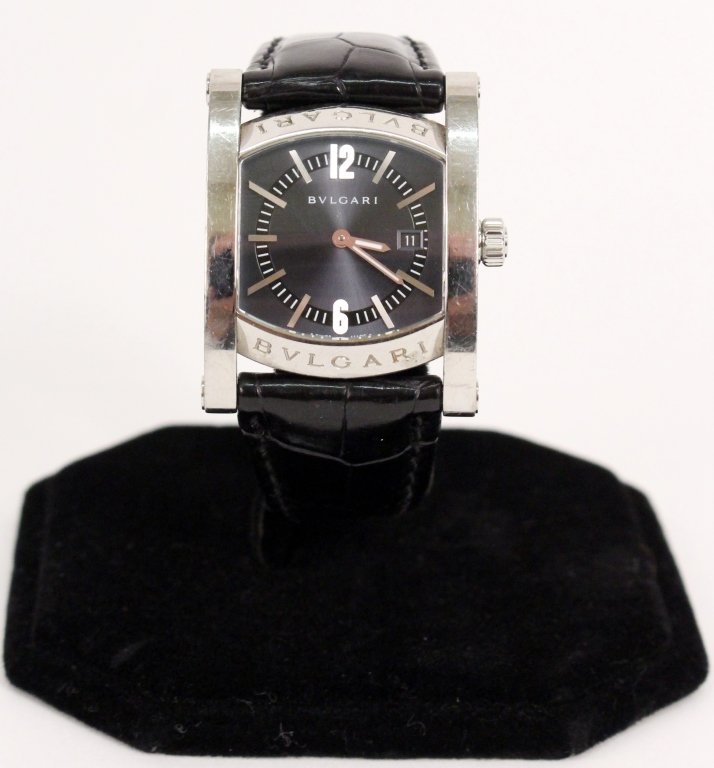 Stainless Steel Strap Watch by Bulgari: Stainless steel cased wrist watch with black leather strap by Bulgari. Back case marked "Assioma AA 39 S L 6631 Fabrique en Suisse". Currently in full working condition. Quartz.