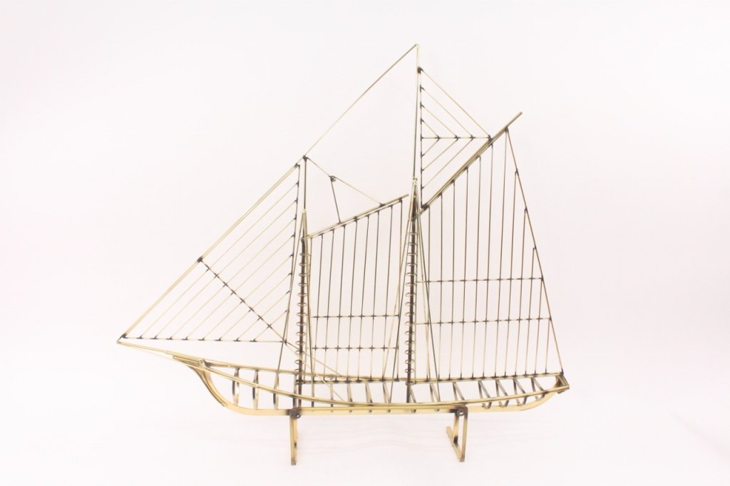 Modernist Curtis Jere Brass Sailboat Sculpture: French, Second half of 20th century. Modern large scale brass metal sail boat table top sculpture, signed and dated by Curtis Jere, 1976. Intricately designed and constructed, this piece can sit as a