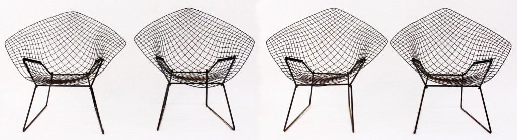 Set of Four Bertoia For Knoll Diamond Chairs: Harry Bertoia (Italian/American, 1915-1978) for Knoll International. Set of four "Diamond" mid-century modern wire lounge chairs in black enameled steel. Height 30.25", width 33.25", depth (at base) 1