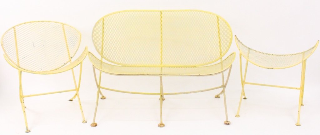 Mid Century Three Piece Orange Slice Patio Set: Mid Century. yellow painted wrought iron Orange Slice form patio set in the manner of Salterini comprised of settee, chair and footstool. Apparently unmarked. Settee height 28", width 40.5", seat dept