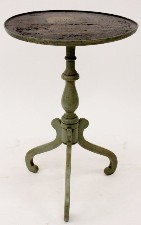 19th C. Swedish Hand Painted Accent Table: Swedish, 19th century. Accent or occassional table with circular top hand painted with provincial still life painting with handled pitcher and fruit in interior within a gilt accented scrolled foliate