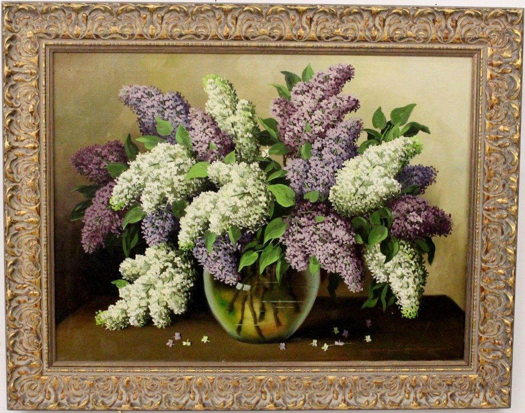 20th C. Continental Oil Still Life Lilacs: Continental School (possibly German), 20th century. Oil on canvas still life of lilacs in a glass vase, signed lower right O. May, in the manner of Raoul M. De Longpre (French, 1859-1911) presented in