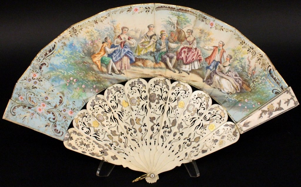 Ladies Hand Embellished Figural & Ivory Fan: Continental School, 19th century. Ladies fan with hand embellished figural scene of courting couples in a lush garden setting within floral and gilt accented scrolled border on pierced gilt, silvered 