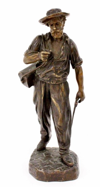 Bronze Figural Sculpture of Architect, Signed: Late 19th/Early 20th century. Cast bronze figural sculpture depicting a bearded man standing at full length in the round on a brick or cobblestone textured oblong base. Figure wearing hat and carrying