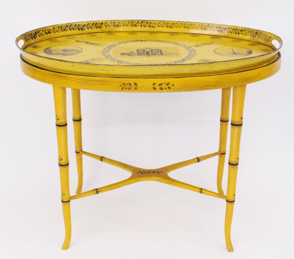 French Regency Style Tole Peinte Tray Table: French, 20th century. Regency-style, tole peinte tray table. Features oval removable tray top and pierced handles on sides. Depicting French soldiers centered with a view of the Arc de Triomph flanked