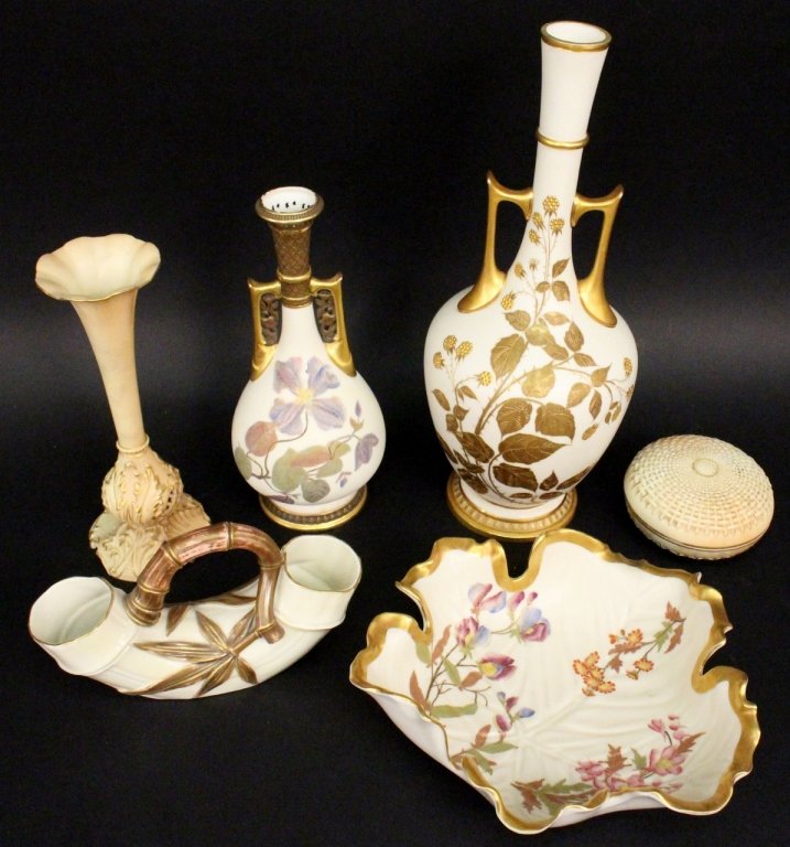 Six Piece Royal Worcester Group: English, 19th/20th century. Collection of six Royal Worcester porcelain items comprising of a tall parcel gilt double handled table vase with leaves and berry fruit motif; a gilt rimmed leaf bowl with
