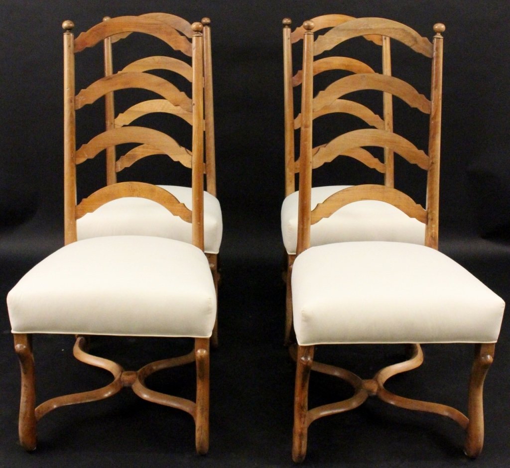 Four French Louis XIV Style Ladder Back Chairs: French. Late 19th/Early 20th Century. Set of four matching Louis XIV style ladder back side chairs, possibly cerused oak, with turned finials over four arched splats and cream colored fabric upholster