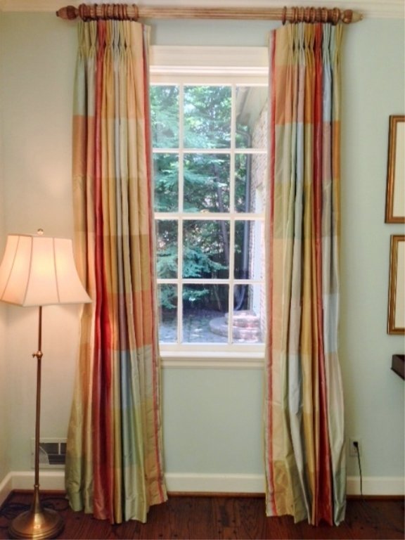 Two Sets of Silk Curtains or Window Treatments: Two sets of matching high quality fine silk checkered mutlicolored curtains or window treatments. Each with round loop hooks on a high quality fluted wood curtain rod. One set measures approximately 1