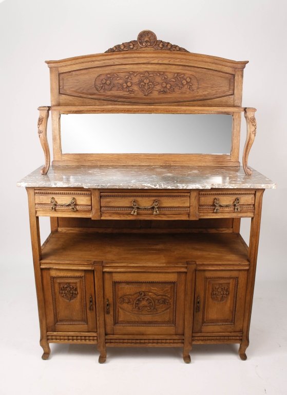 Louis XV Style Belgium Oak Mirrored Buffet: Belgium, Late 19th/early 20th century. Louis XV style oak buffet with superstructure with shell and foliate cresting over a beaded and paneled back carved with scrolling foliage over a rectangular she