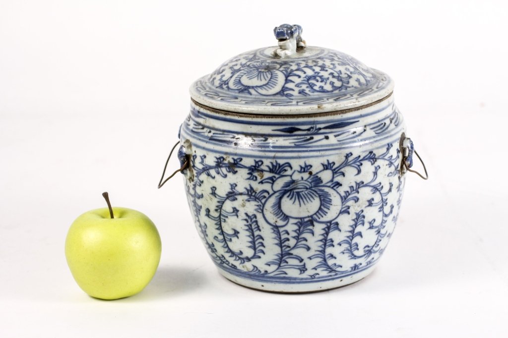 Chinese Kangxi Style Blue & White Ginger Jar: Chinese, 20th century, possibly earlier. Kangxi style blue and white porcelain lidded ginger jar with floral, vine and sketch like dash motif throughout. Lid (possibly a marriage) with seated applied 