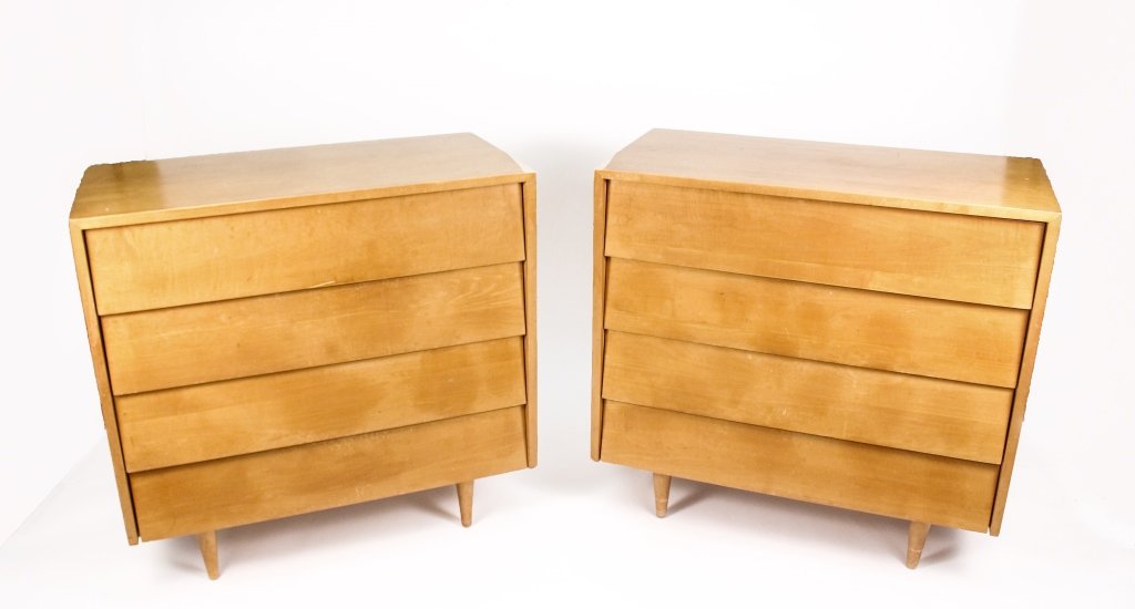 Pair of Knoll Louver Four Drawer Dressers: American, mid 20th century. Pair of Knoll louvered front four drawer dressers composed of maple wood. Marked on interior of drawer with label for manufacturer. Each raised on four tapered feet. Height