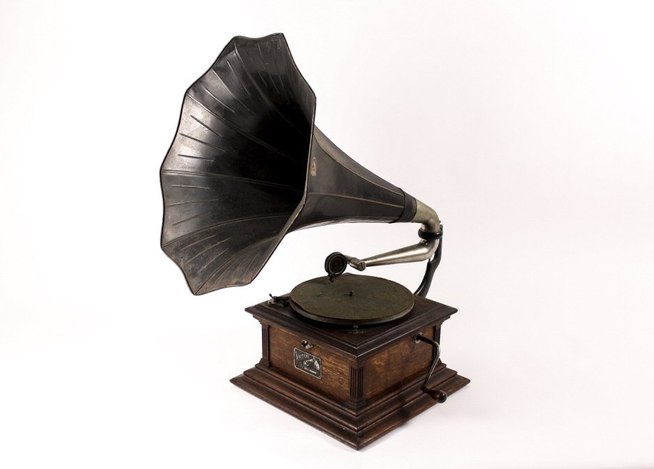Victor External Horn Phonograph: American, circa 1901 - 1920. Victor External Horn Phonograph also called Victor Victrola phonograph with oak case and simple knob speed control. Bears the original "Nipper" decal on thin painted metal