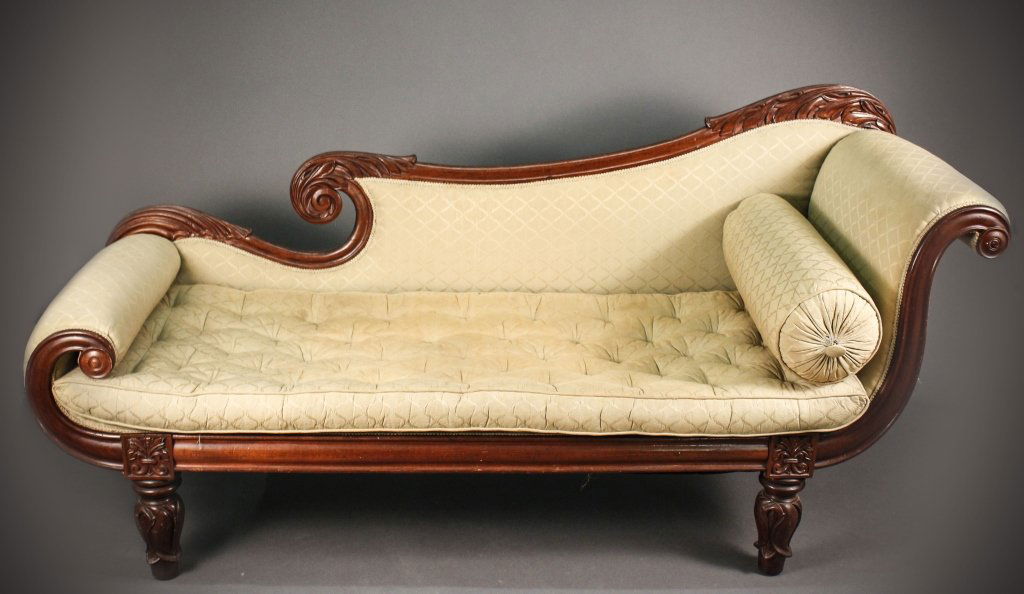 Classical Philadelphia Recamier or Fainting Couch: American, circa 1820. Classical Philadelphia carved recamier, fainting couch or chaise lounge mahogany with poplar secondary wood, with foliate carved crestrail, the ends scrolled carved terminating i