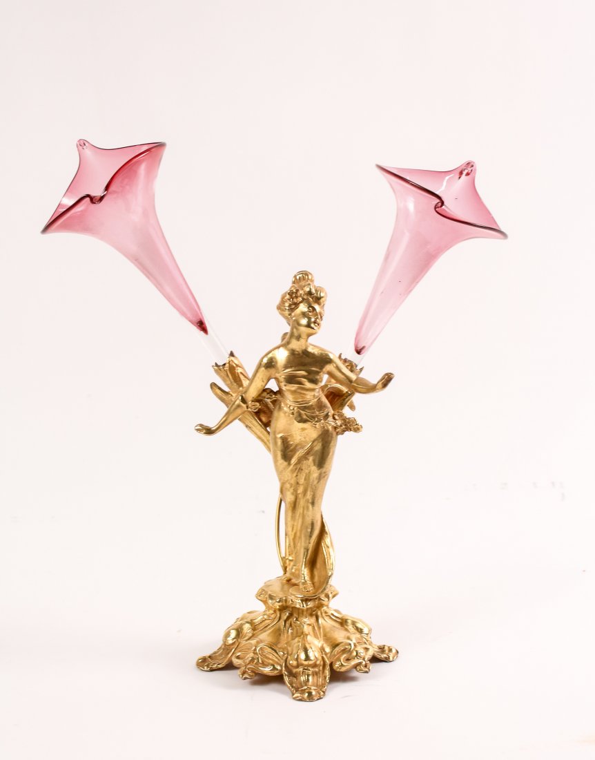 Art Nouveau Gilt FIgural Sculpture: Art Nouveau gilt cast metal figural sculpture, originally intended to be an epergne (missing glass flutes) depicting a young beauty with floral ornamented hair and swag sash in a wet draped gown stand