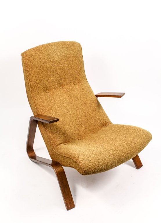 Eero Saarinen Grasshopper Lounge Chair: Mid century modern Eero Saarinen (American/Finnish, 1910-1961) Grasshopper lounge chair for Knoll International (circa 1945-1965) with rust brown to orange fabric upholstery on a stained and laminated