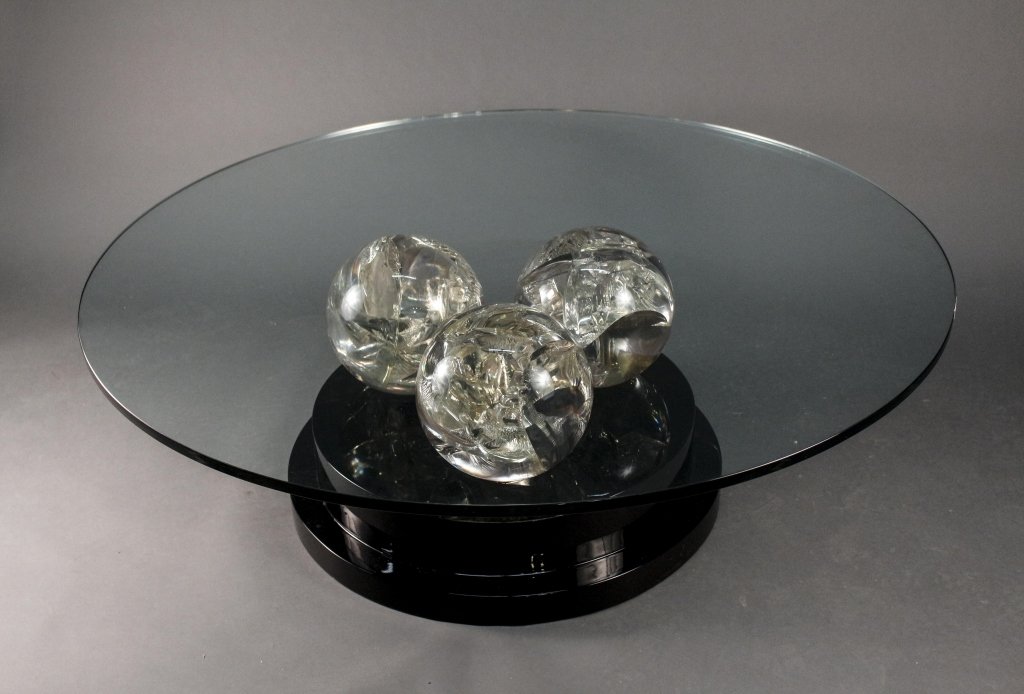 Attr. to Charles Hollis Jones Coffee Table: Attributed to Charles Hollis Jones (American, b. 1945-), modern glass top lucite ball cluster coffee table. Modern coffee table with heavy round glass top above lucite base with three large clear orbs