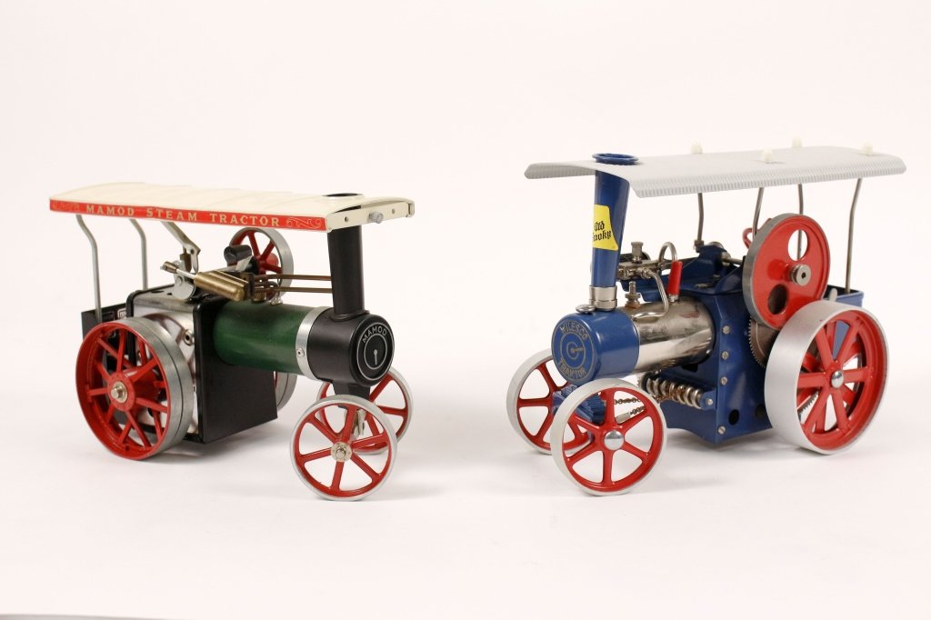 Two Live Steam Engine Toys: 20th century. Two live steam engine toys comprised a Mamod Live Steam Engine Tractor Toy No. 1, made in England and the other a Wilesco Old Smoky live steam traktor/tractor, made in Germany. Mamod mea